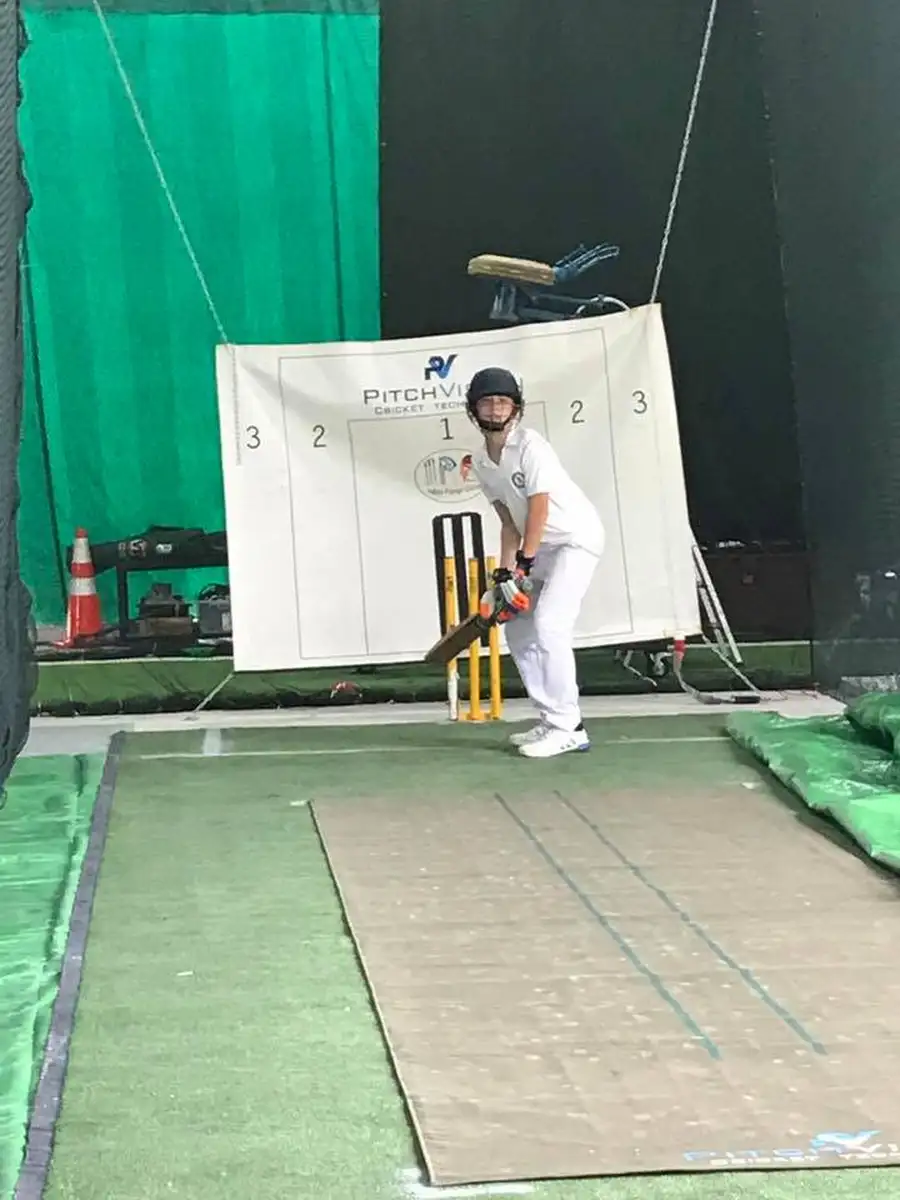 Junior cricket player at PitchVision crease Singapore