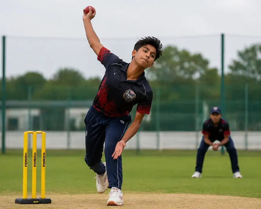 UWSM cricket player bowling action Singapore